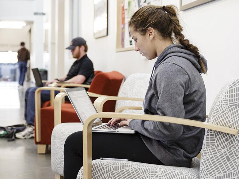 Students working on their computers in Gaige